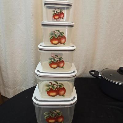 Plastic food storage containers with a Rapid Mac cooker - Nostalgia mini 7 egg cooker - a tiered serving tray and a new knife