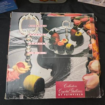 Plastic food storage containers with a Rapid Mac cooker - Nostalgia mini 7 egg cooker - a tiered serving tray and a new knife