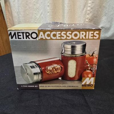 Plastic food storage containers with a Rapid Mac cooker - Nostalgia mini 7 egg cooker - a tiered serving tray and a new knife