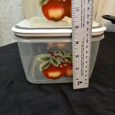 Plastic food storage containers with a Rapid Mac cooker - Nostalgia mini 7 egg cooker - a tiered serving tray and a new knife