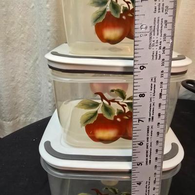 Plastic food storage containers with a Rapid Mac cooker - Nostalgia mini 7 egg cooker - a tiered serving tray and a new knife