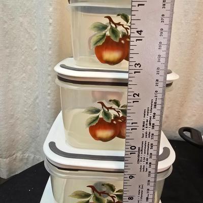 Plastic food storage containers with a Rapid Mac cooker - Nostalgia mini 7 egg cooker - a tiered serving tray and a new knife