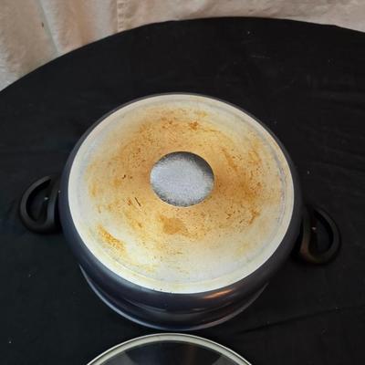 Good cook pan set and a silicone hot pad
