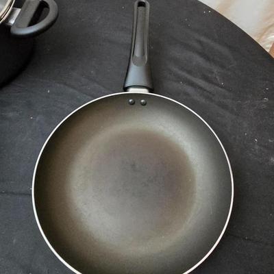 Good cook pan set and a silicone hot pad