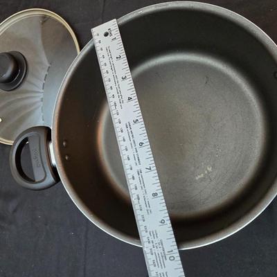 Good cook pan set and a silicone hot pad