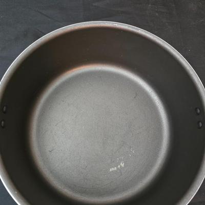 Good cook pan set and a silicone hot pad
