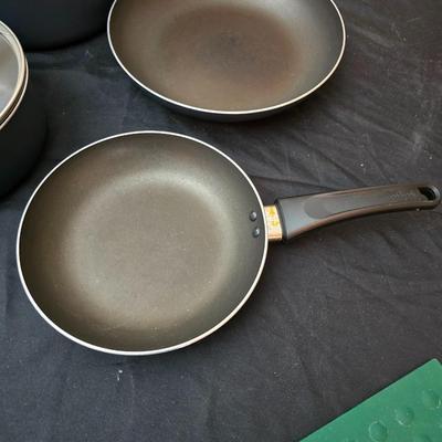 Good cook pan set and a silicone hot pad