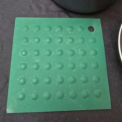 Good cook pan set and a silicone hot pad