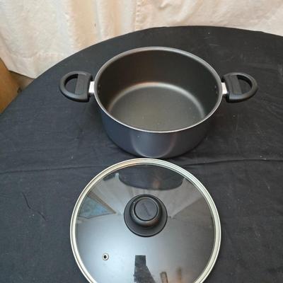 Good cook pan set and a silicone hot pad