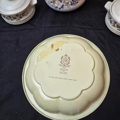 Soup pot with two covered soup bowls and a beautiful metal bread pan