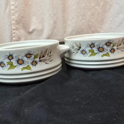 Soup pot with two covered soup bowls and a beautiful metal bread pan