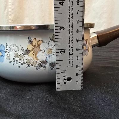 Soup pot with two covered soup bowls and a beautiful metal bread pan