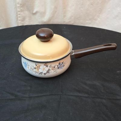 Soup pot with two covered soup bowls and a beautiful metal bread pan