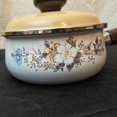 Soup pot with two covered soup bowls and a beautiful metal bread pan