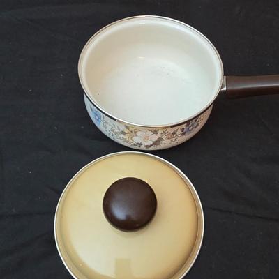 Soup pot with two covered soup bowls and a beautiful metal bread pan
