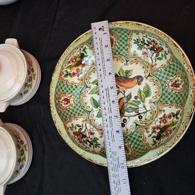 Soup pot with two covered soup bowls and a beautiful metal bread pan