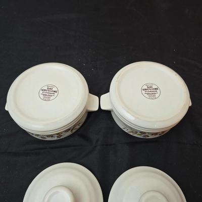 Soup pot with two covered soup bowls and a beautiful metal bread pan