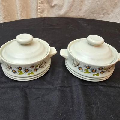Soup pot with two covered soup bowls and a beautiful metal bread pan
