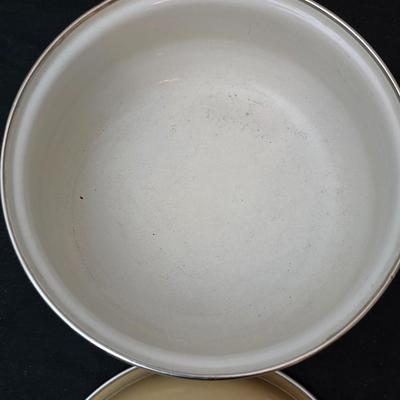 Soup pot with two covered soup bowls and a beautiful metal bread pan