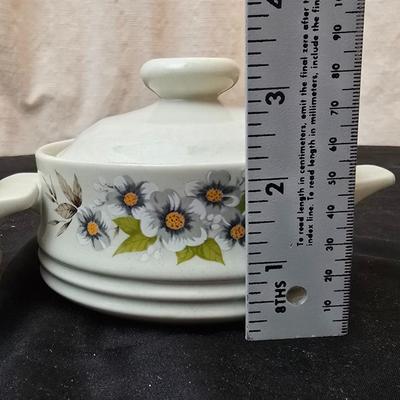 Soup pot with two covered soup bowls and a beautiful metal bread pan