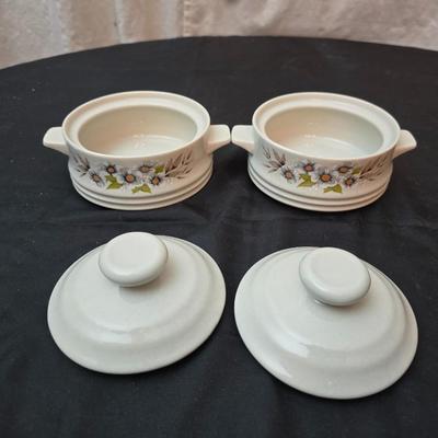 Soup pot with two covered soup bowls and a beautiful metal bread pan