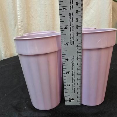 Perfect for morning fruit shakes! Cuisinart drink mixer with some plastic cups and plastic containers for fluids