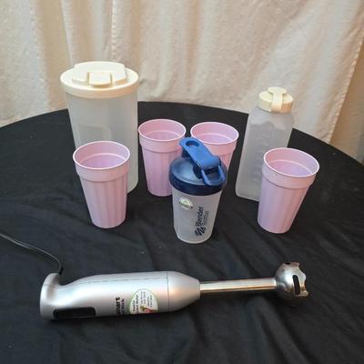 Perfect for morning fruit shakes! Cuisinart drink mixer with some plastic cups and plastic containers for fluids