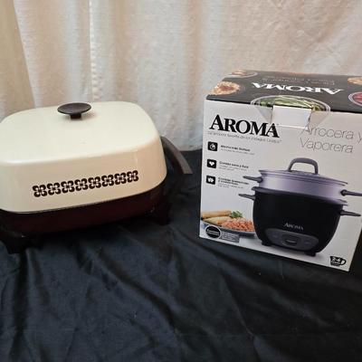 West Bend Electric skillet with lid and an Aroma Rice cooker & food steamer