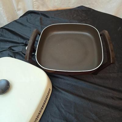 West Bend Electric skillet with lid and an Aroma Rice cooker & food steamer