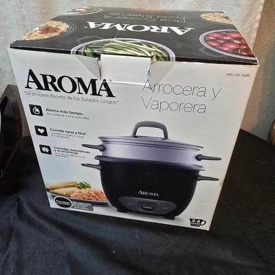 West Bend Electric skillet with lid and an Aroma Rice cooker & food steamer
