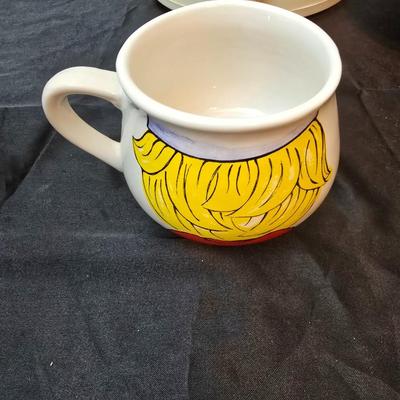 Crockpot with Campbells soup bowl, Ziggy soup bowl, and two hand painted bowls and a Campbells cookbook