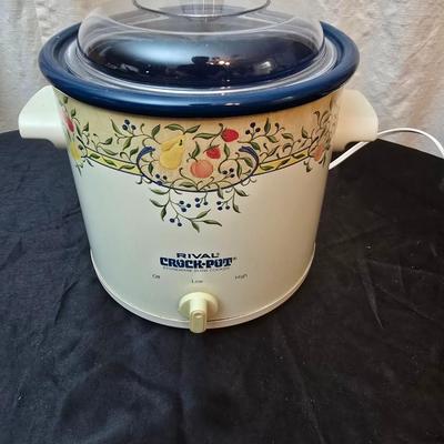 Crockpot with Campbells soup bowl, Ziggy soup bowl, and two hand painted bowls and a Campbells cookbook