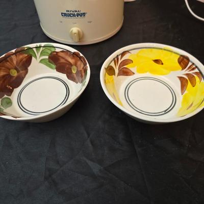 Crockpot with Campbells soup bowl, Ziggy soup bowl, and two hand painted bowls and a Campbells cookbook