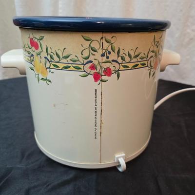 Crockpot with Campbells soup bowl, Ziggy soup bowl, and two hand painted bowls and a Campbells cookbook
