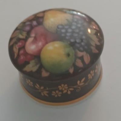 Ceramic trinket box with vintage brooch, earrings and more