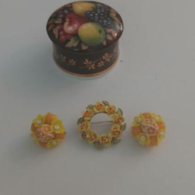 Ceramic trinket box with vintage brooch, earrings and more