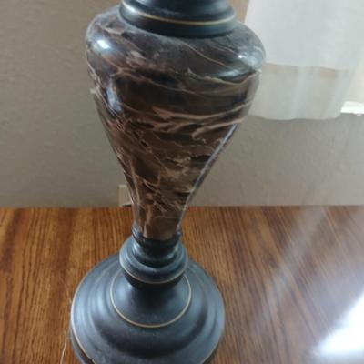 End table with under storage and a beautiful table lamp