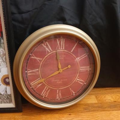 Canvas wall hanging with large wall clock