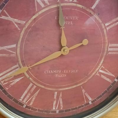 Canvas wall hanging with large wall clock