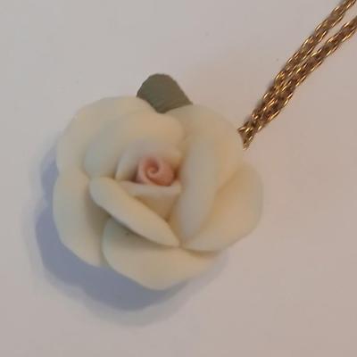 1928 Rose necklace with a pair of vintage clip-on earrings