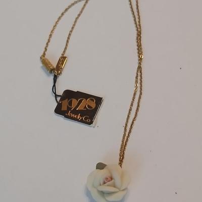 1928 Rose necklace with a pair of vintage clip-on earrings