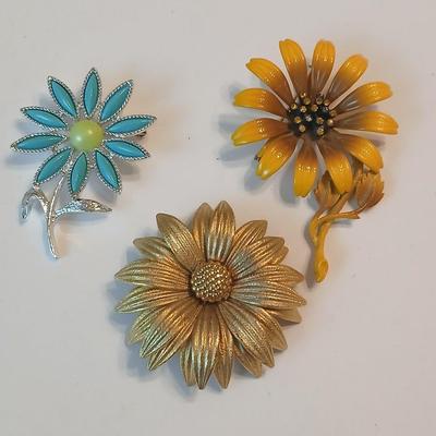 Three vintage flower brooch pins