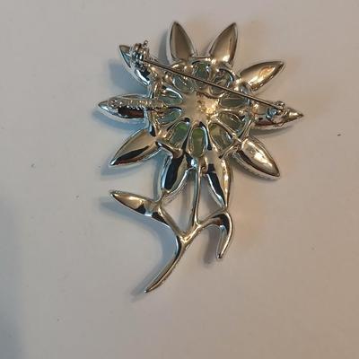 Three vintage flower brooch pins