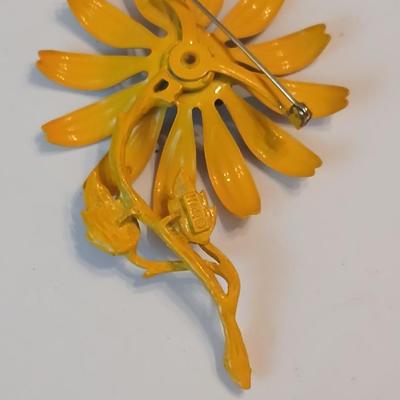 Three vintage flower brooch pins