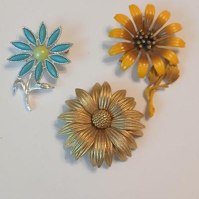 Three vintage flower brooch pins