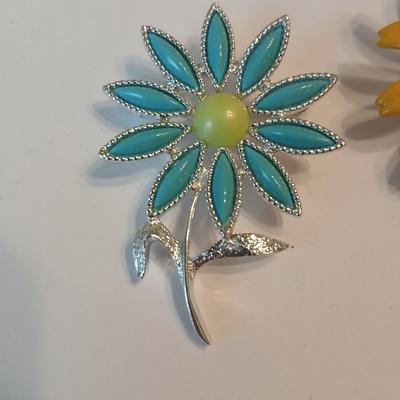 Three vintage flower brooch pins