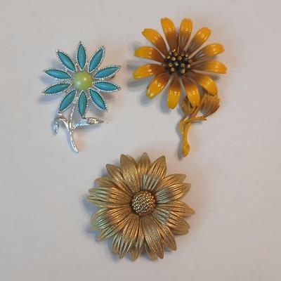 Three vintage flower brooch pins