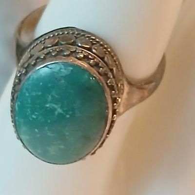 Sterling silver marked post earrings with a beautiful ring size 7