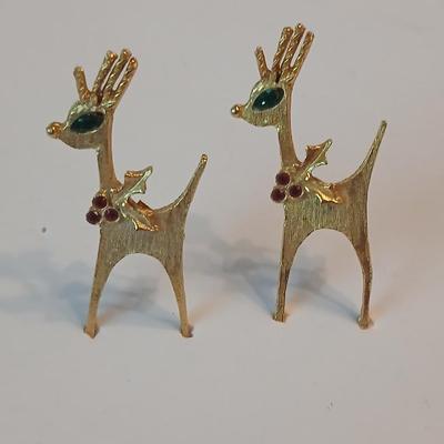 Two vintage reindeer pins with gemstones
