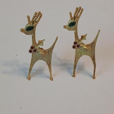 Two vintage reindeer pins with gemstones